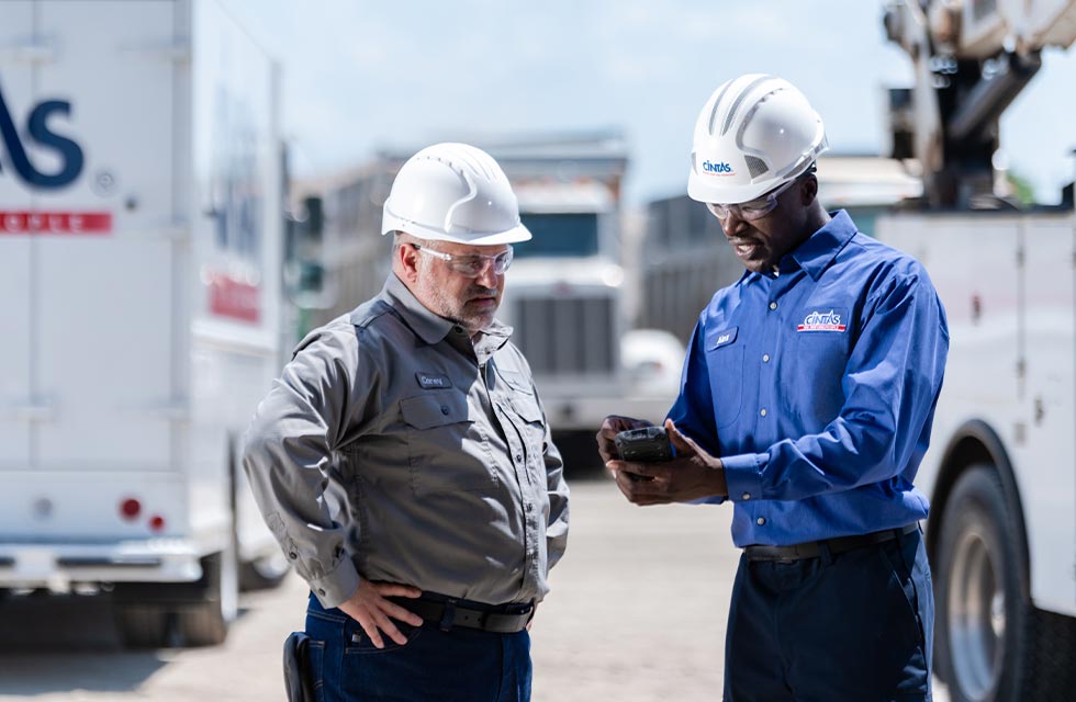 cintas service representative helping customer