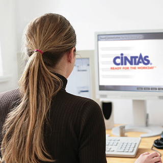 Woman sitting at computer doing online training